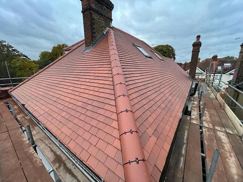 top of a roof showing the chimney and scaffolding