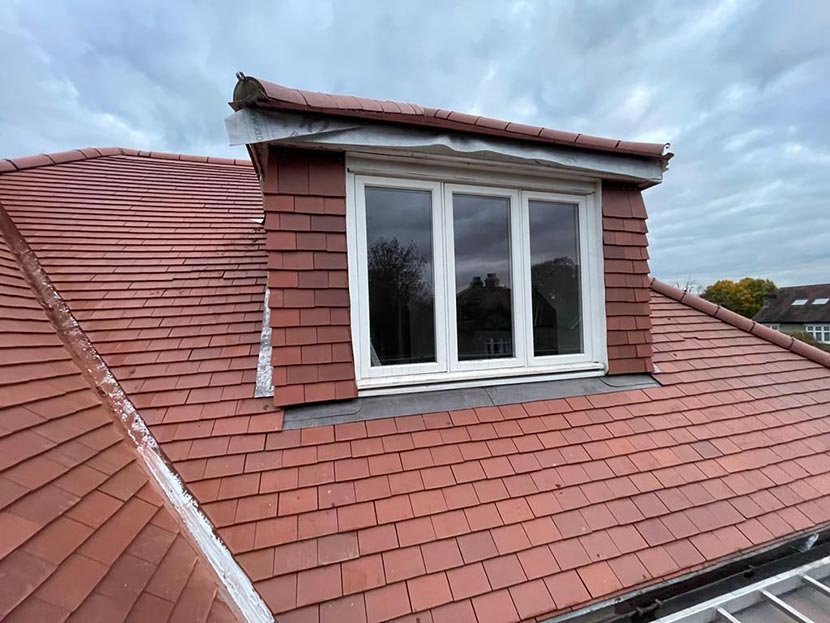 top of a roof with loft window