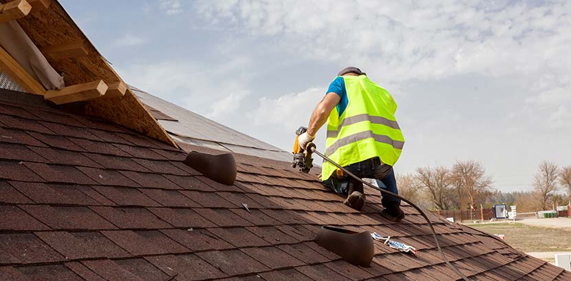 roofer working on a roof